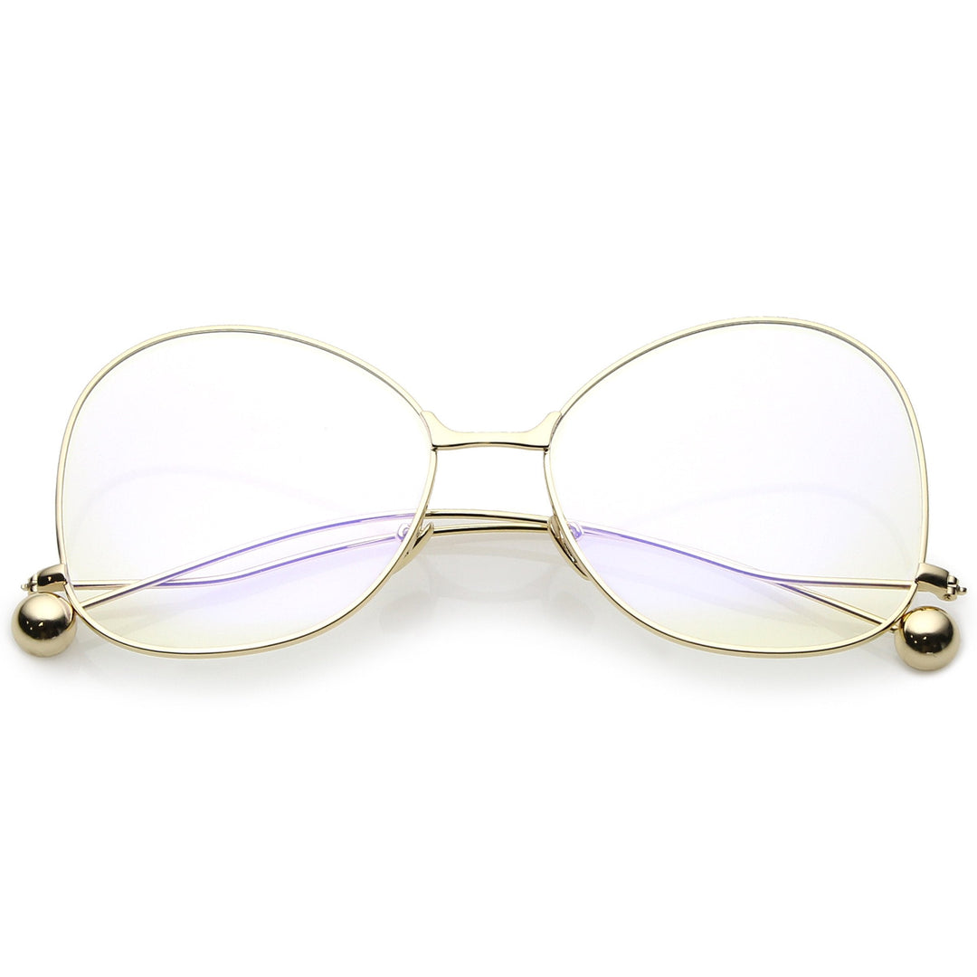 Gafas vintage con lentes transparentes de mariposa de gran tamaño