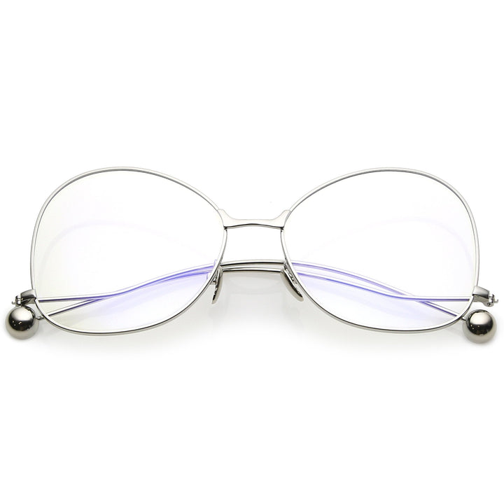 Gafas vintage con lentes transparentes de mariposa de gran tamaño