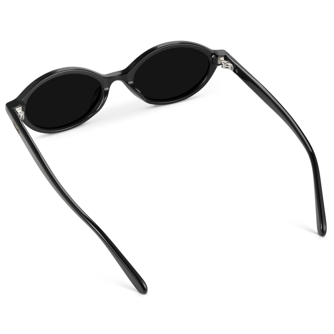 WMP Eyewear – Women’s Trendy Oval Sunglasses: Small Retro Frame, 90s Y2K Style, Perfect for Everyday Wear (Black/Triple Black Lens)