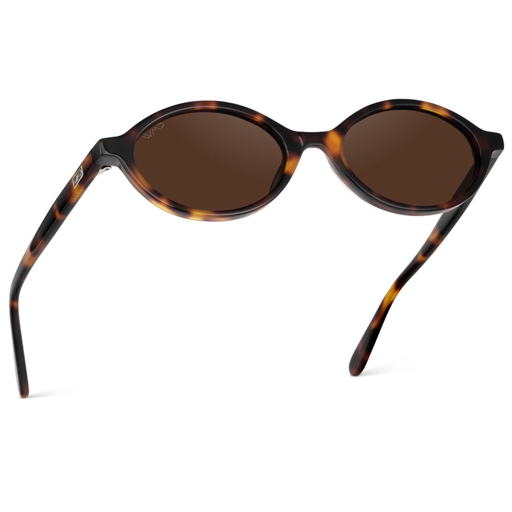 WMP Eyewear – Women’s Trendy Oval Sunglasses: Small Retro Frame, 90s Y2K Style, Perfect for Everyday Wear (Brown Tortoise/Dark Brown Lens)