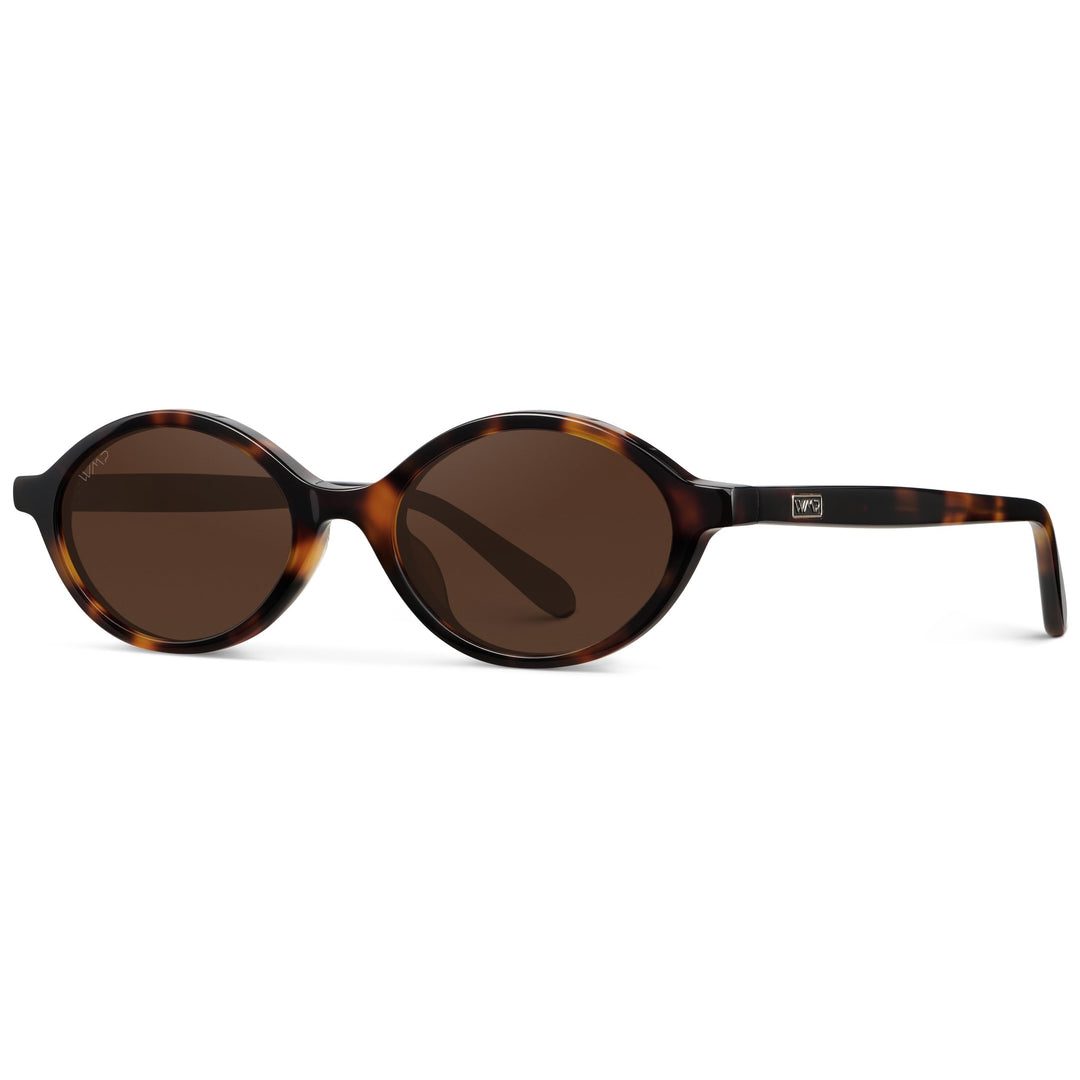 WMP Eyewear – Women’s Trendy Oval Sunglasses: Small Retro Frame, 90s Y2K Style, Perfect for Everyday Wear (Brown Tortoise/Dark Brown Lens)