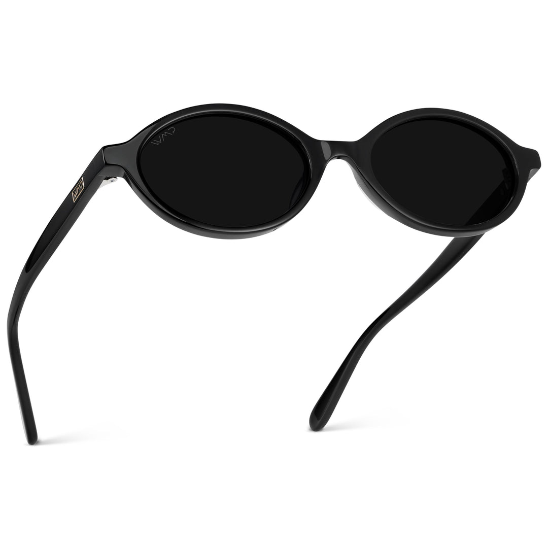 WMP Eyewear – Women’s Trendy Oval Sunglasses: Small Retro Frame, 90s Y2K Style, Perfect for Everyday Wear (Black/Triple Black Lens)